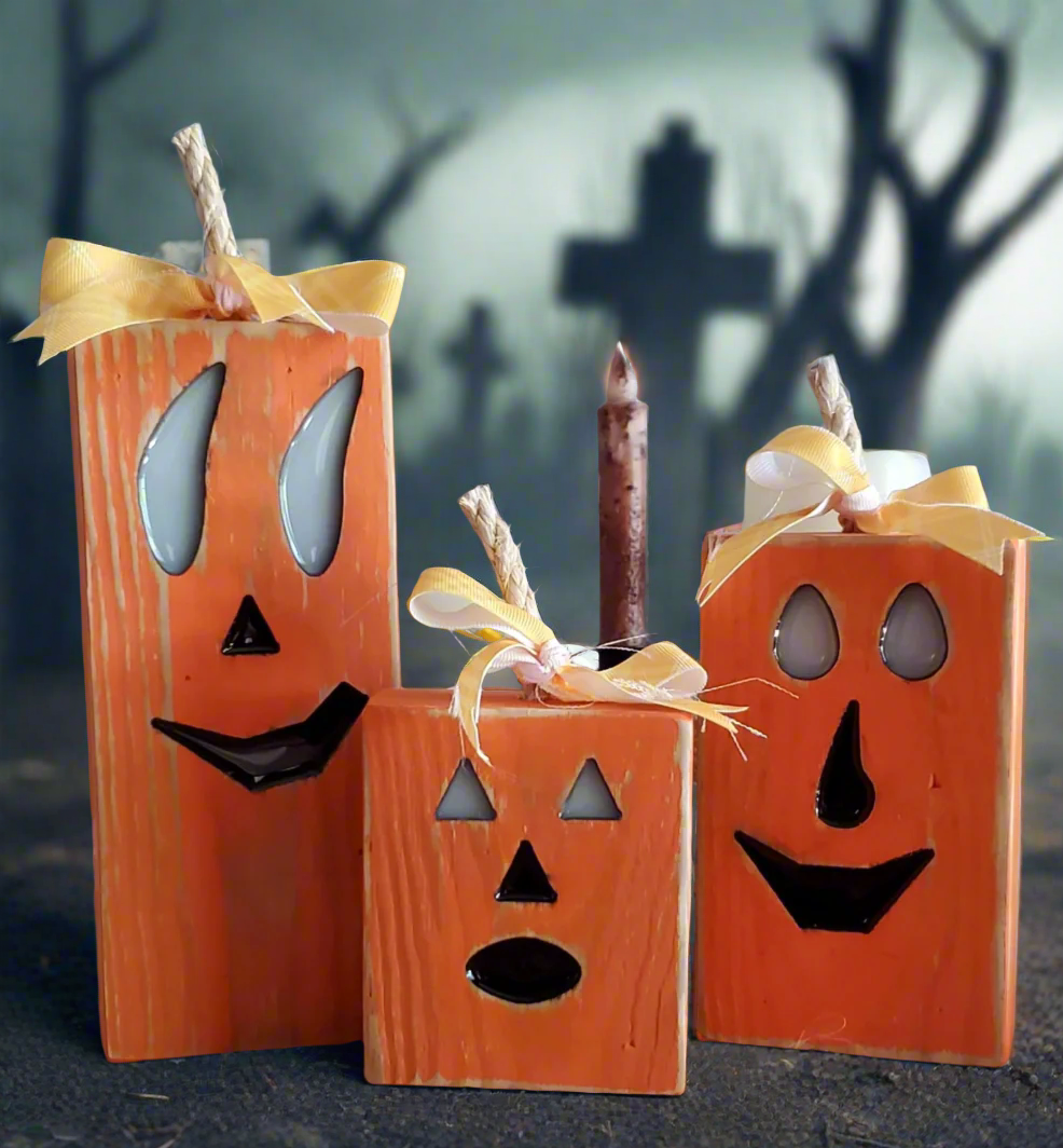 Wooden block halloween pumpkin set in a scary graveyard scene
